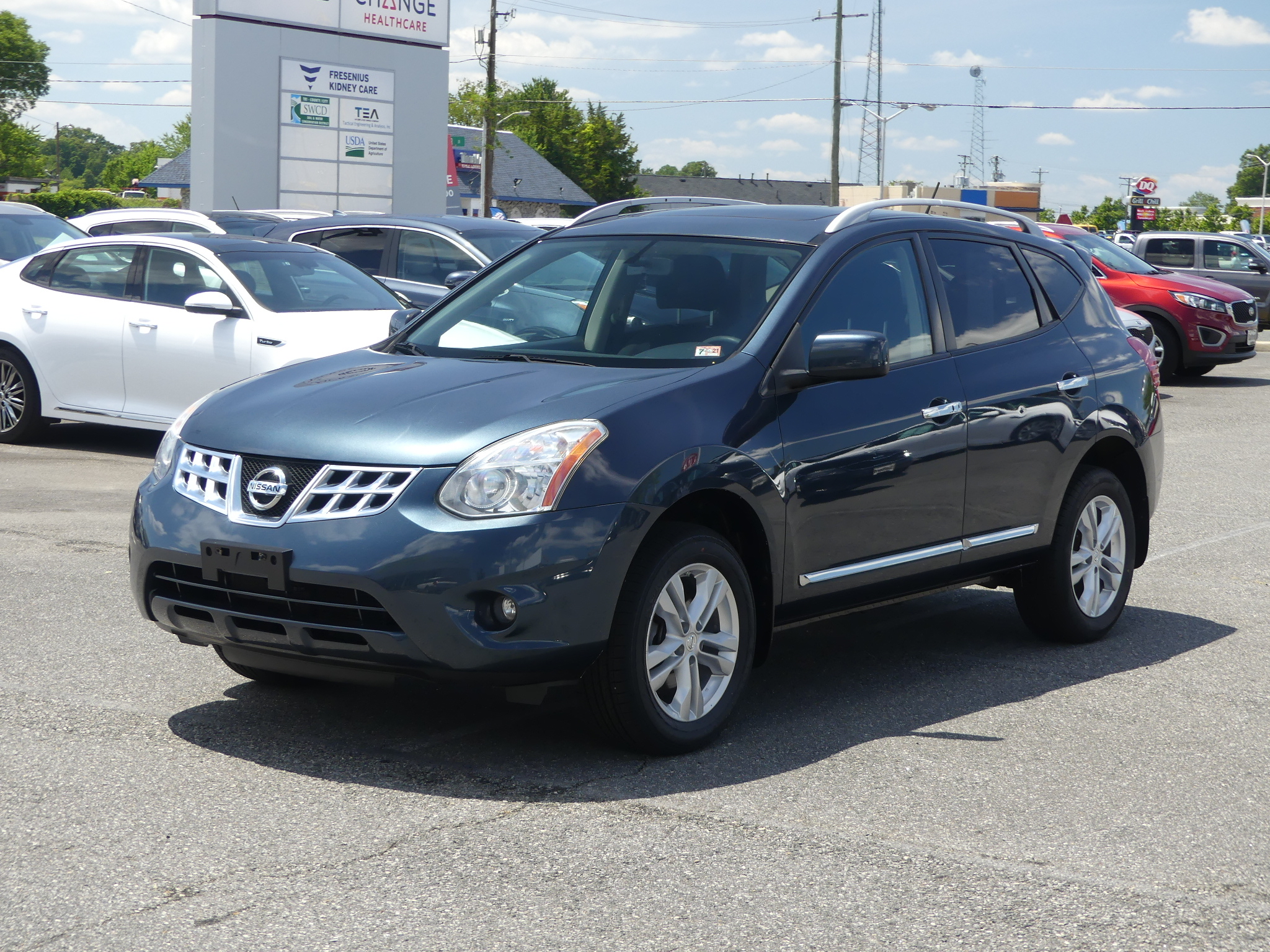 PreOwned 2013 Nissan Rogue AWD 4dr SV All Wheel Drive Sport Utility